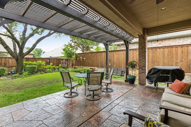 view of patio / terrace featuring area for grilling, a fenced backyard, a pergola, and outdoor dining space