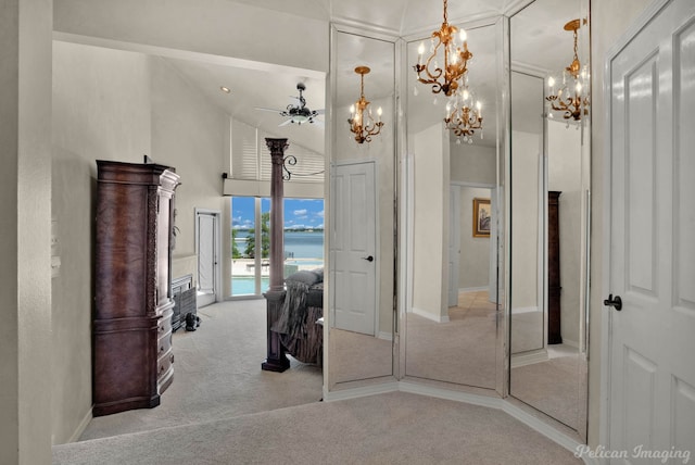 5705 Shoreline Dr, Shreveport, LA 71119 - hall featuring a water view, carpet flooring, a notable chandelier, and baseboards
