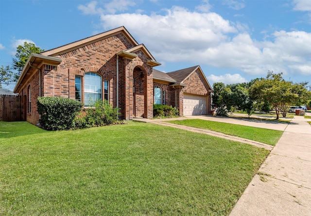 single story home featuring fence, brick siding, concrete driveway, a garage, and a front lawn