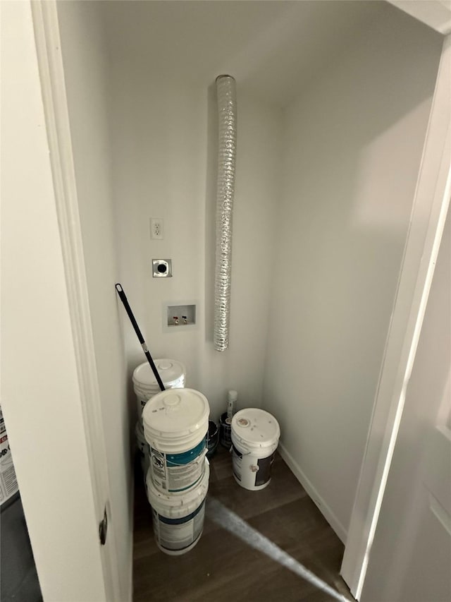room details featuring baseboards and wood finished floors