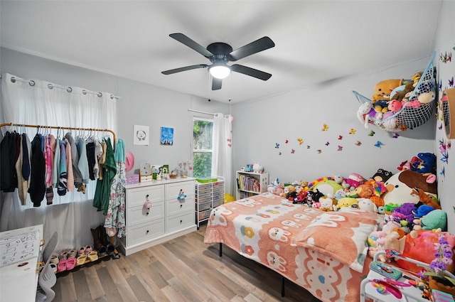 11519 Desdemona Dr, Dallas, TX 75228 - bedroom with light wood-style floors and a ceiling fan