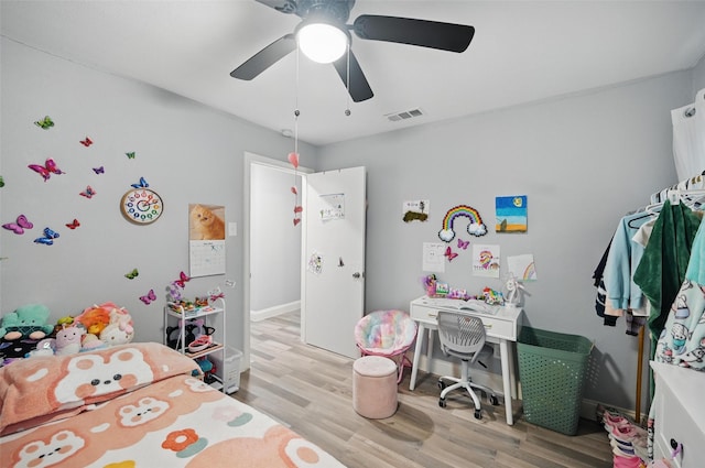 11519 Desdemona Dr, Dallas, TX 75228 - bedroom featuring wood finished floors, a ceiling fan, and baseboards