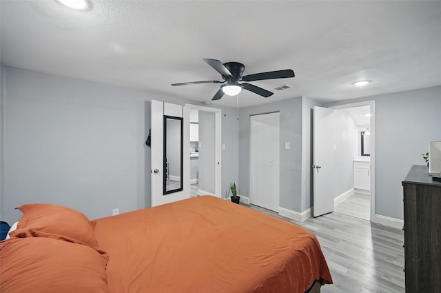 11519 Desdemona Dr, Dallas, TX 75228 - bedroom with light wood-type flooring, baseboards, ensuite bath, recessed lighting, and ceiling fan