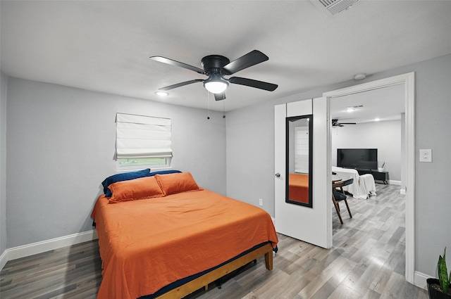 11519 Desdemona Dr, Dallas, TX 75228 - bedroom with wood finished floors and baseboards