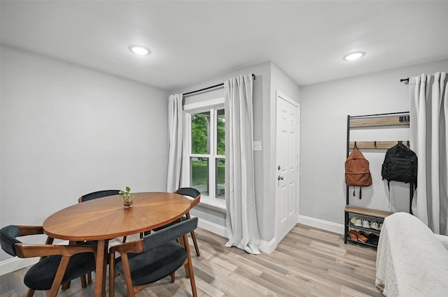 11519 Desdemona Dr, Dallas, TX 75228 - dining space featuring baseboards, light wood-style flooring, and recessed lighting