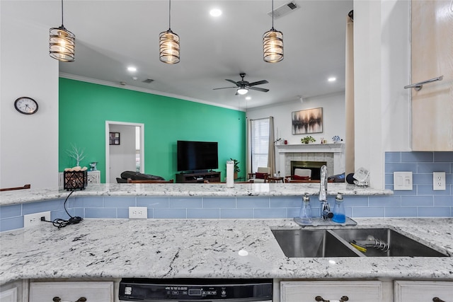3811 Maywood Dr, Carrollton, TX 75007 - kitchen with a sink, open floor plan, dishwashing machine, backsplash, and ceiling fan