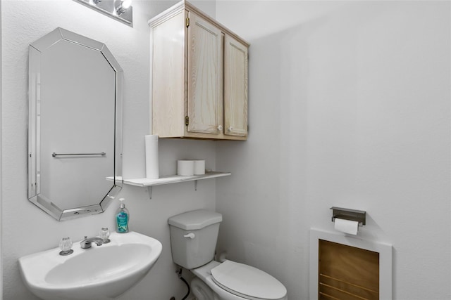 3811 Maywood Dr, Carrollton, TX 75007 - bathroom featuring a sink and toilet