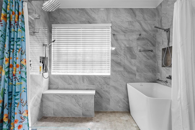 3811 Maywood Dr, Carrollton, TX 75007 - bathroom featuring tiled shower, a tub to relax in, and tile walls