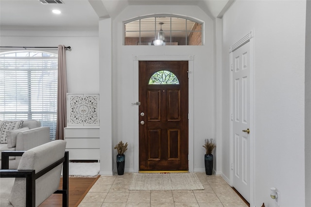 3811 Maywood Dr, Carrollton, TX 75007 - foyer with light tile patterned flooring and baseboards