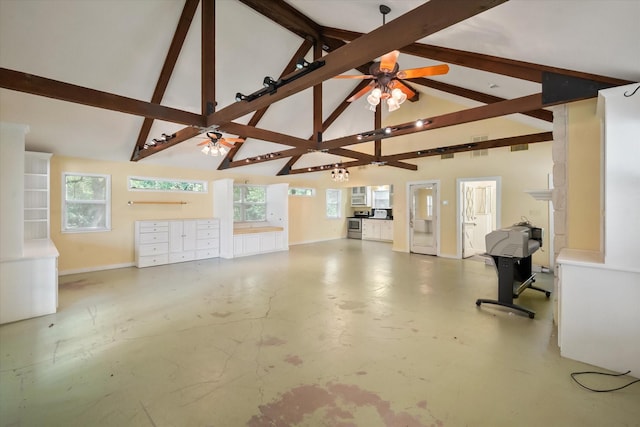 unfurnished living room featuring baseboards, ceiling fan, concrete floors, high vaulted ceiling, and beamed ceiling