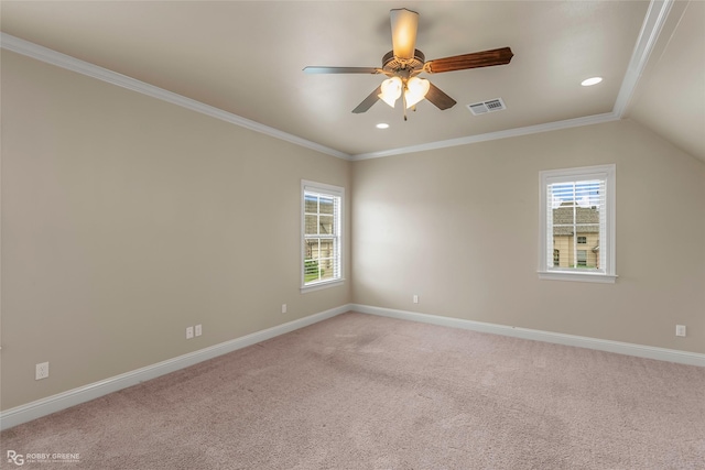 unfurnished room featuring a wealth of natural light, visible vents, baseboards, and light carpet
