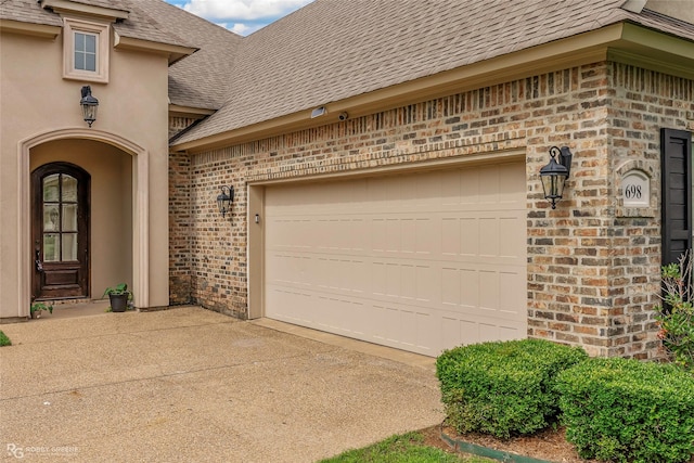 exterior space featuring concrete driveway