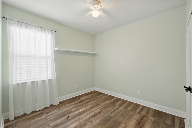 7616 Duck Bay Rd, Fort Worth, TX 76120 - empty room with a ceiling fan, wood finished floors, and baseboards