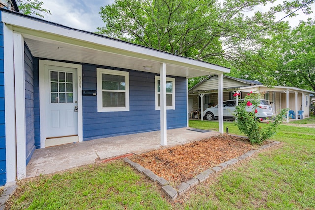 309 James St, Terrell, TX 75160 - property entrance featuring a yard and a porch