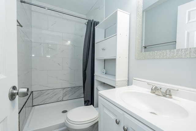 309 James St, Terrell, TX 75160 - bathroom with vanity, a shower stall, and toilet
