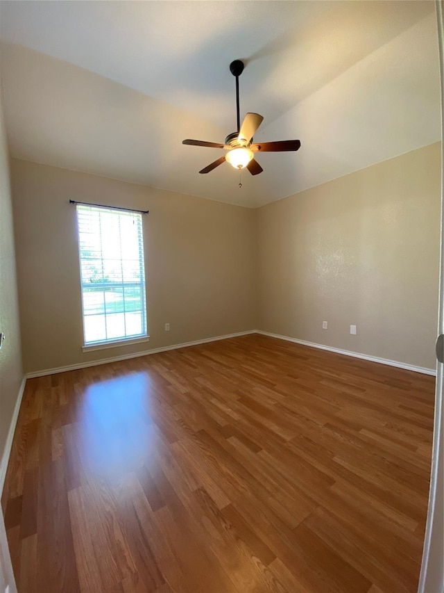 615 Parker Ln, Granbury, TX 76048 - unfurnished room with baseboards, a ceiling fan, and wood finished floors