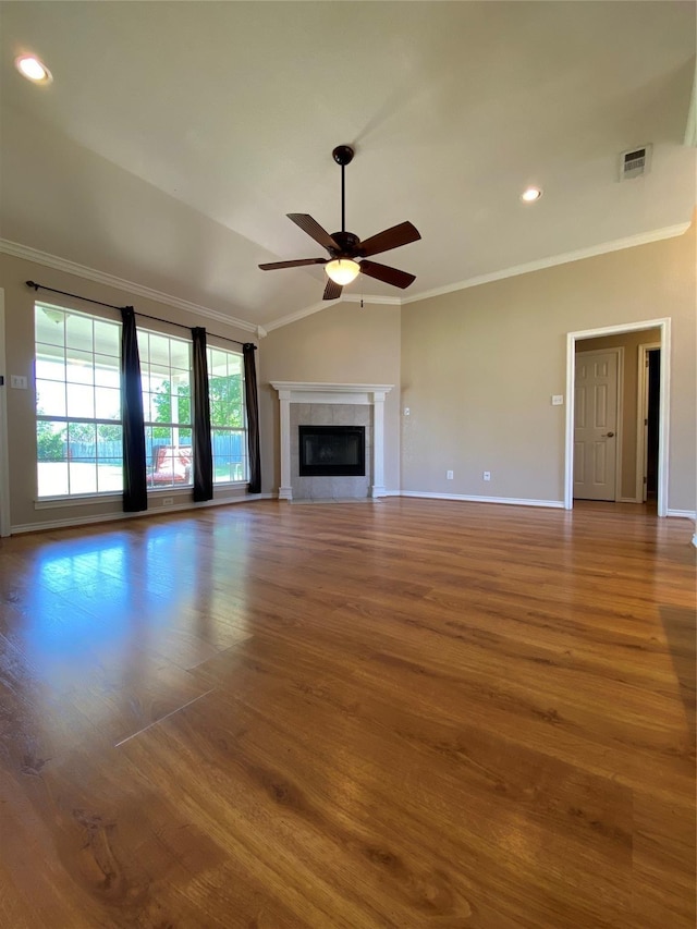 615 Parker Ln, Granbury, TX 76048 - unfurnished living room with crown molding, visible vents, baseboards, ceiling fan, and vaulted ceiling
