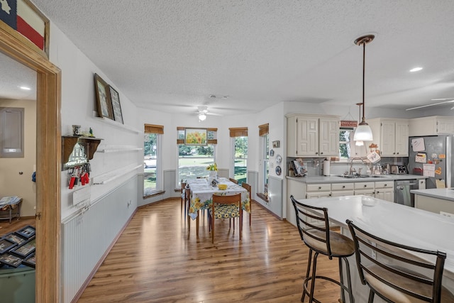 906 County Road 2770, Honey Grove, TX 75446 - kitchen featuring light countertops, appliances with stainless steel finishes, ceiling fan, and a textured ceiling