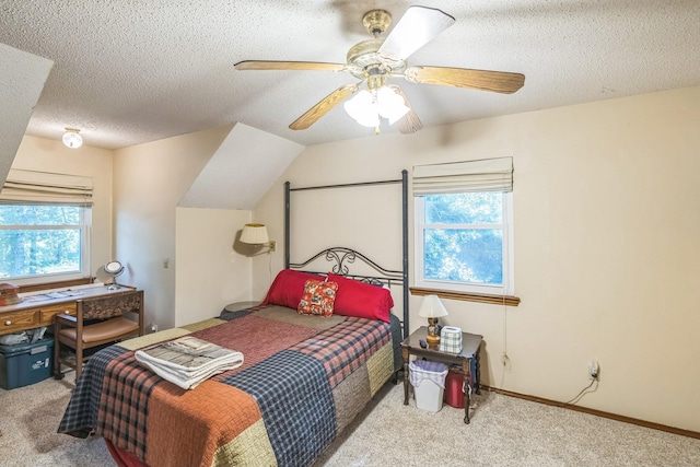 906 County Road 2770, Honey Grove, TX 75446 - carpeted bedroom featuring ceiling fan, a textured ceiling, and multiple windows