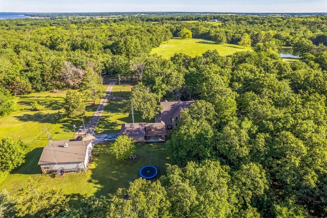906 County Road 2770, Honey Grove, TX 75446 - drone / aerial view featuring a view of trees