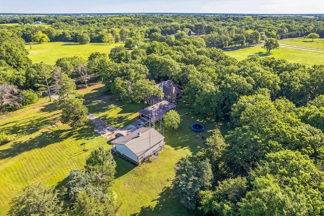 906 County Road 2770, Honey Grove, TX 75446 - aerial view featuring a rural view and a wooded view
