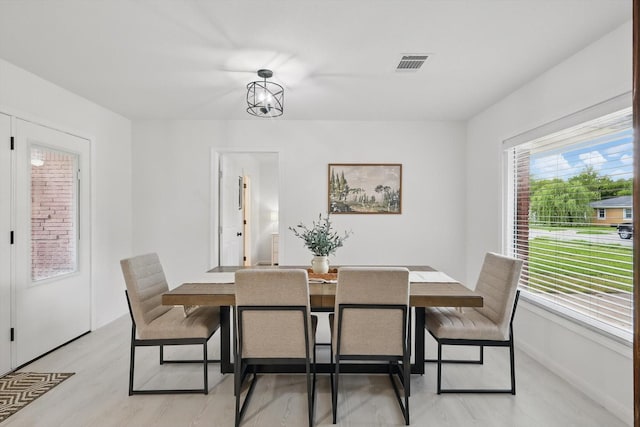 1718 Heather Rd, Gainesville, TX 76240 - dining area featuring light wood-type flooring and baseboards