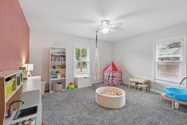 1718 Heather Rd, Gainesville, TX 76240 - game room with carpet floors, ceiling fan, and baseboards
