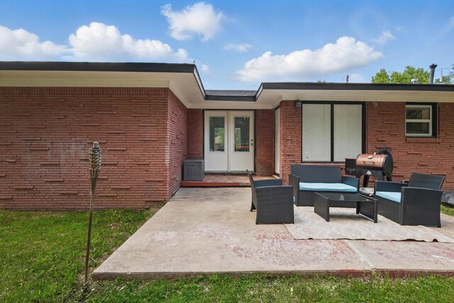 1718 Heather Rd, Gainesville, TX 76240 - view of patio with an outdoor hangout area, a grill, and french doors