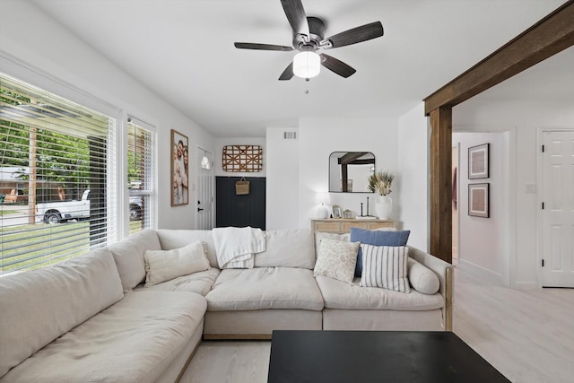 1718 Heather Rd, Gainesville, TX 76240 - living area featuring ceiling fan, wet bar, and baseboards