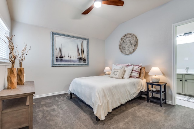 6844 Massa Ln, Frisco, TX 75034 - carpeted bedroom featuring lofted ceiling, baseboards, ensuite bath, ceiling fan, and a sink