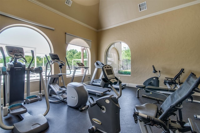 6844 Massa Ln, Frisco, TX 75034 - workout area with a towering ceiling, a textured wall, baseboards, and visible vents