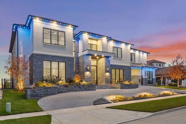 3650 Balfour Ct, Frisco, TX 75034 - contemporary home with stone siding, stucco siding, and a front lawn