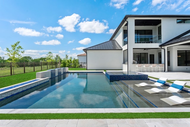 3650 Balfour Ct, Frisco, TX 75034 - view of pool featuring ceiling fan, a fenced backyard, a pool with connected hot tub, and a patio