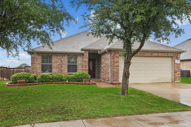 ranch-style home featuring brick siding, fence, an attached garage, concrete driveway, and a front lawn