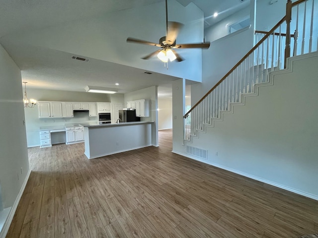 7636 Arbor Ridge Ct, Fort Worth, TX 76112 - unfurnished living room featuring baseboards, visible vents, and dark wood finished floors
