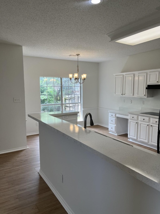 7636 Arbor Ridge Ct, Fort Worth, TX 76112 - kitchen with baseboards, dark wood-style flooring, white cabinets, and a textured ceiling
