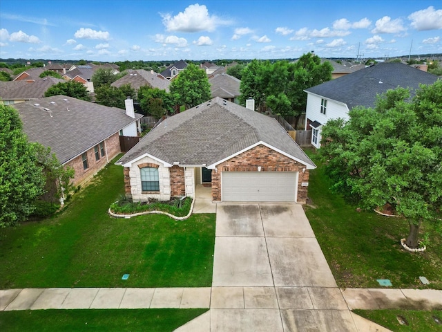 ranch-style home with brick siding, a residential view, driveway, a garage, and a front lawn