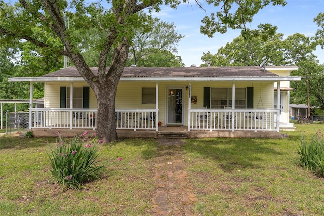 6111 County Road 2610, Bonham, TX 75418 - single story home featuring a porch and a front yard