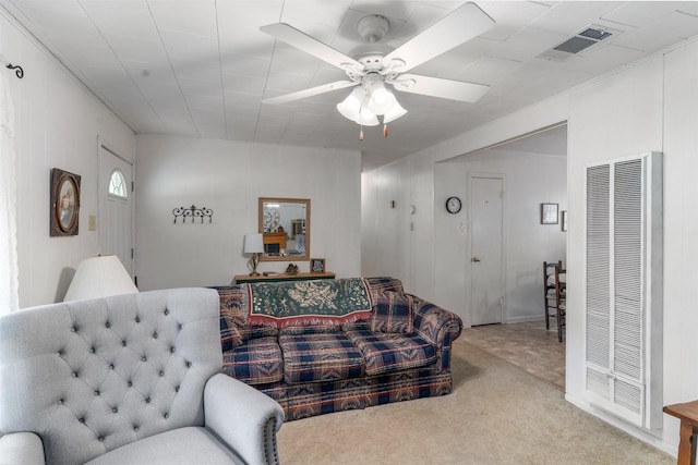 6111 County Road 2610, Bonham, TX 75418 - carpeted living room with ceiling fan, a heating unit, and visible vents