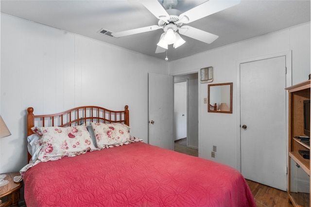 6111 County Road 2610, Bonham, TX 75418 - bedroom featuring visible vents, ceiling fan, and wood finished floors