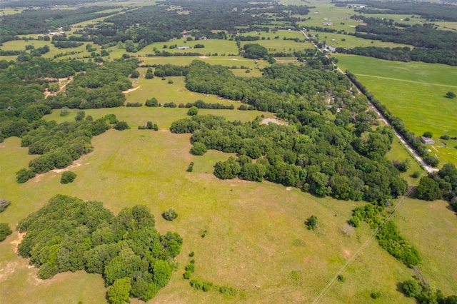 6111 County Road 2610, Bonham, TX 75418 - birds eye view of property with a rural view