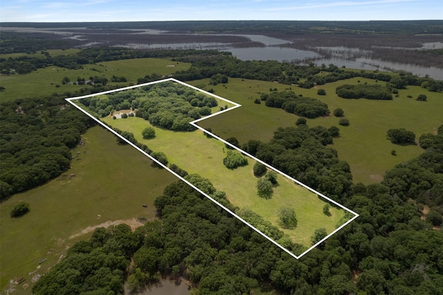 6111 County Road 2610, Bonham, TX 75418 - drone / aerial view featuring a water view
