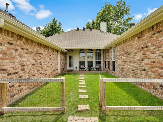 6330 Dublin Dr, Garland, TX 75044 - view of grassy yard with french doors