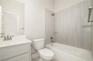 609 Alaina Dr, Desoto, TX 75115 - full bath with vanity, toilet, and washtub / shower combination