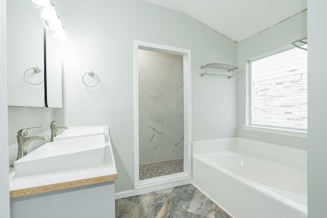 108 Freedom Trl, Forney, TX 75126 - bathroom featuring double vanity, a sink, a bath, a shower stall, and vaulted ceiling