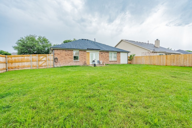 108 Freedom Trl, Forney, TX 75126 - back of property with a yard, brick siding, and a fenced backyard