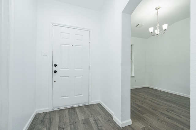 108 Freedom Trl, Forney, TX 75126 - foyer featuring baseboards, dark wood finished floors, a chandelier, and arched walkways