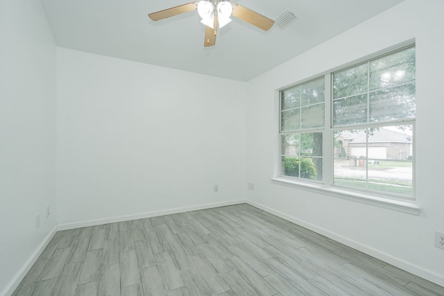 108 Freedom Trl, Forney, TX 75126 - spare room featuring a wealth of natural light, light wood-style flooring, and visible vents
