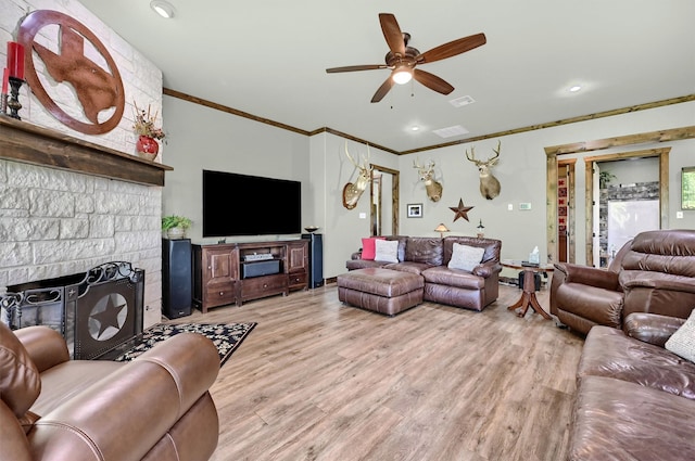 650 Scoggins Rd, Tioga, TX 76271 - living area featuring ornamental molding, ceiling fan, and light wood-style flooring