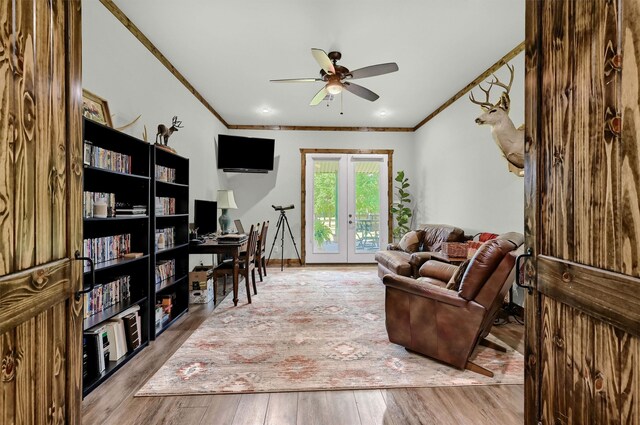 650 Scoggins Rd, Tioga, TX 76271 - sitting room featuring ornamental molding, ceiling fan, wood finished floors, and french doors
